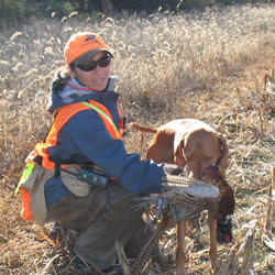 Thunder retrieves pheasant to Mel
