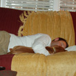 Aaron cuddles Vizsla puppy Lola