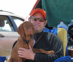 Aaron with new Vizsla puppy Trip at a hunt test